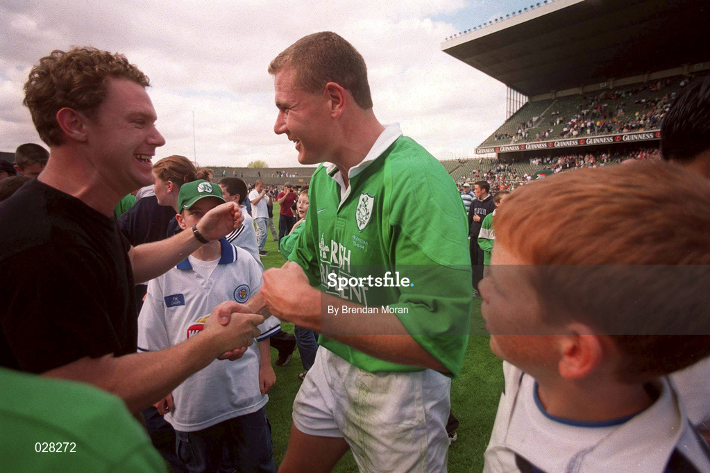 28 August 1999; Matt Mostyn of Ireland with supporters following the Rugby World Cup Warm-up match between Ireland and Argentina at Lansdowne Road in Dublin. Photo by Brendan Moran/Sportsfile