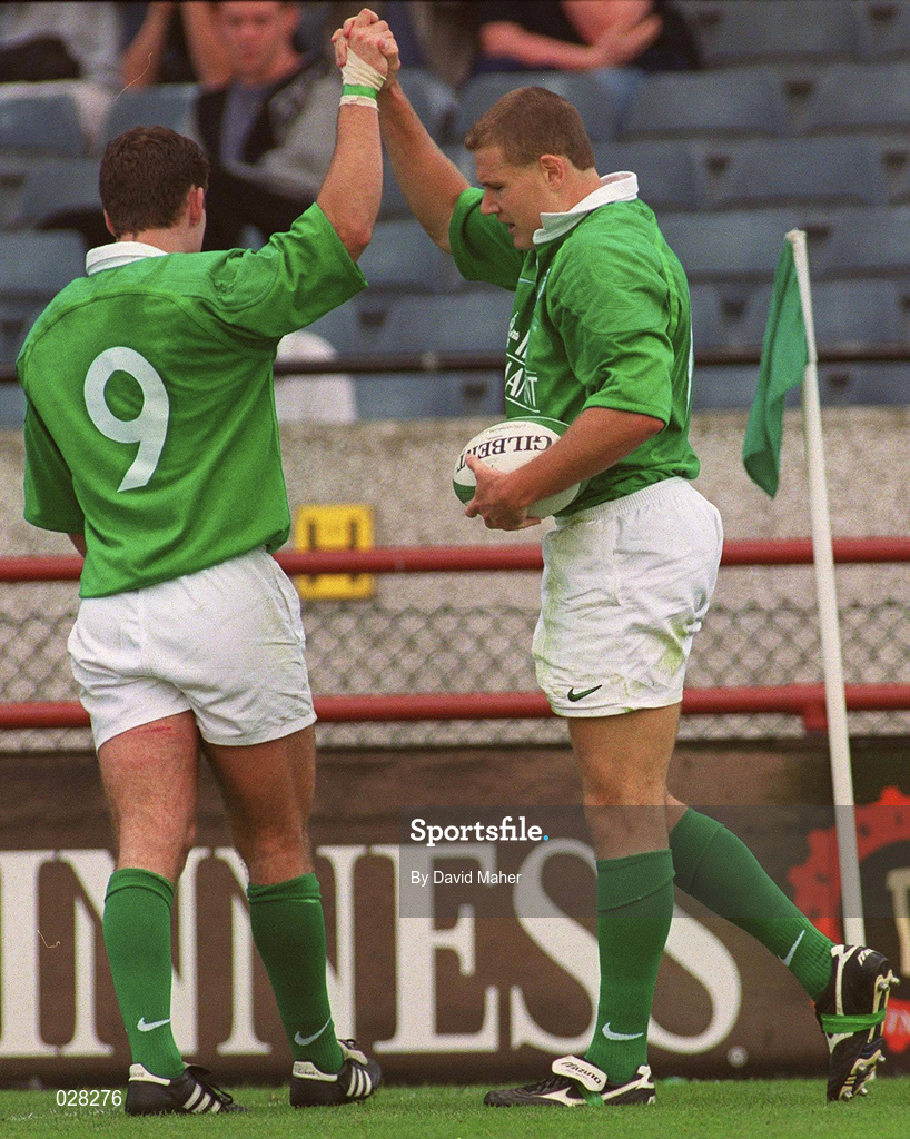 28 August 1999; Matt Mostyn, right, is congratulated by his Ireland team-mate Tom Tierney, 9, after scoring their second try during the Rugby World Cup Warm-up match between Ireland and Argentina at Lansdowne Road in Dublin. Photo by David Maher/Sportsfile
