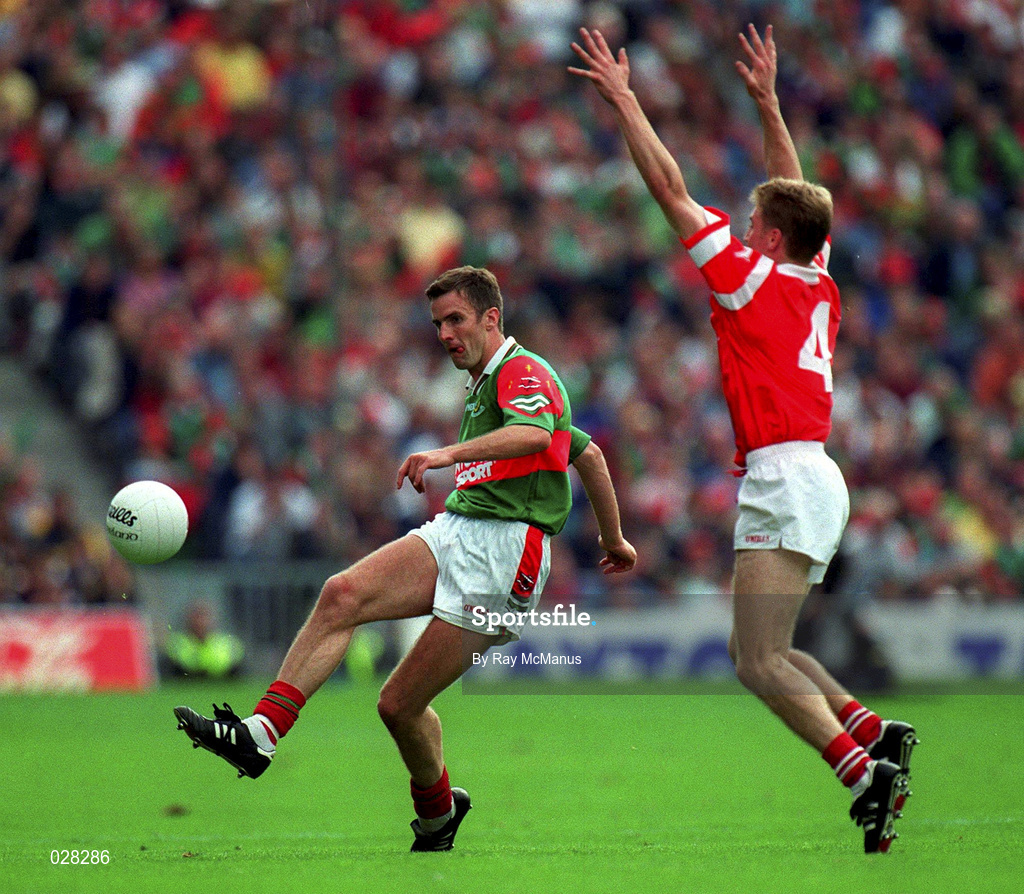 22 August 1999; Anthony Lynch of Cork moves in to block Maurice Sherdian of Mayo during the Bank of Ireland All-Ireland Senior Football Championship Semi-Final match between Cork and Mayo at Croke Park in Dublin. Photo by Ray McManus/Sportsfile