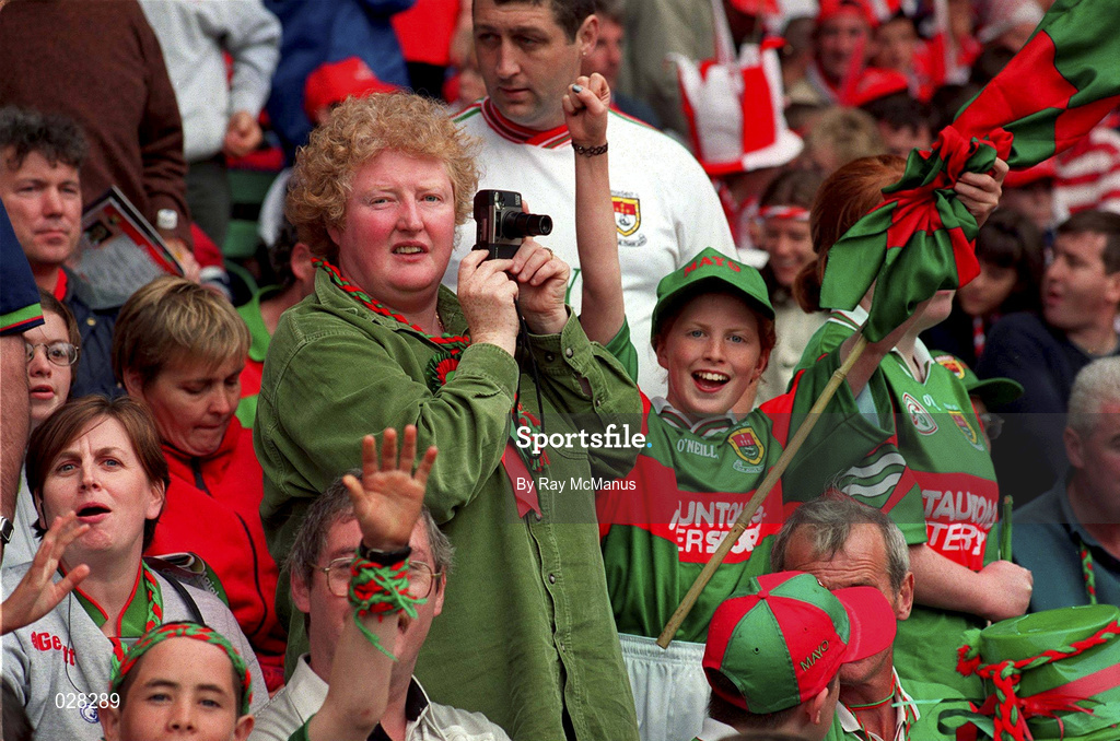22 August 1999; A Mayo supporter records the occasion on her camera during the Bank of Ireland All-Ireland Senior Football Championship Semi-Final match between Cork and Mayo at Croke Park in Dublin. Photo by Ray McManus/Sportsfile