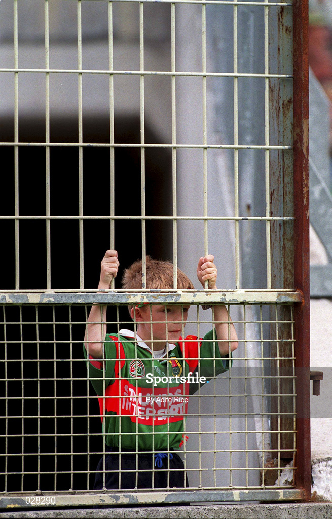 22 August 1999; A young Mayo supporter watches on during the Bank of Ireland All-Ireland Senior Football Championship Semi-Final match between Cork and Mayo at Croke Park in Dublin. Photo by Aoife Rice/Sportsfile