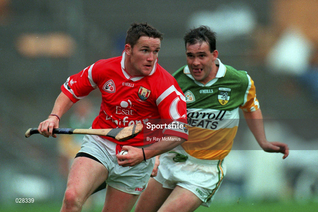 8 August 1999; Michael O'Connell of Cork in action against Johnny Pilkington of Offaly during the Guinness All-Ireland Senior Hurling Championship Semi-Final match between Cork and Offaly at Croke Park in Dublin. Photo by Ray McManus/Sportsfile