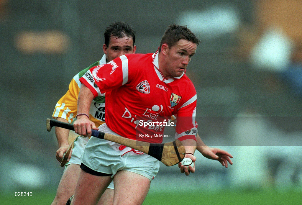 8 August 1999; Michael O'Connell of Cork in action against Johnny Pilkington of Offaly during the Guinness All-Ireland Senior Hurling Championship Semi-Final match between Cork and Offaly at Croke Park in Dublin. Photo by Ray McManus/Sportsfile