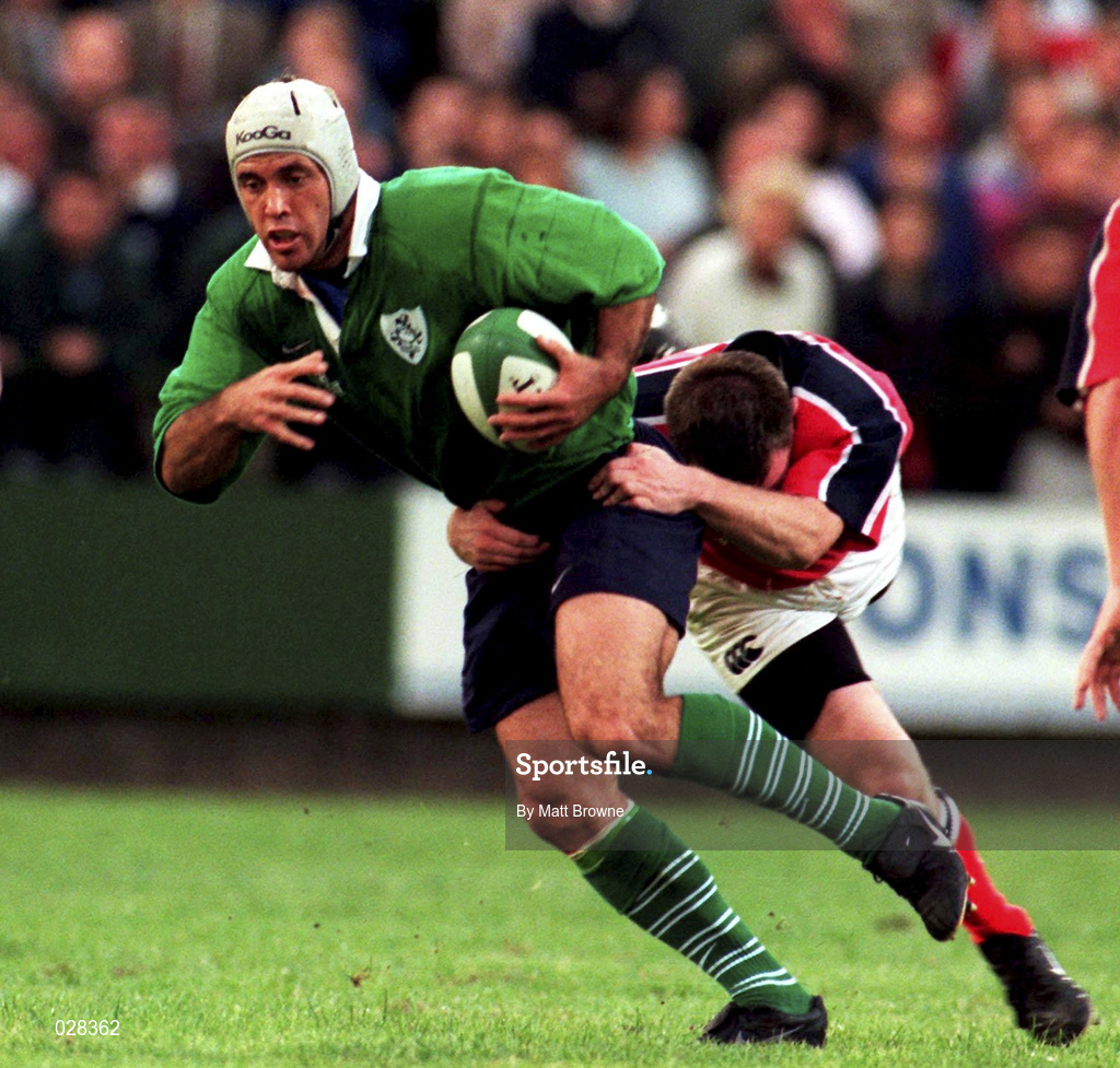 10 September 1999; Mike Mullins of Ireland is tackled by John Kelly of Munster during the Representative Match between Munster and Ireland XV at Musgrave Park in Cork. Photo by Matt Browne/Sportsfile