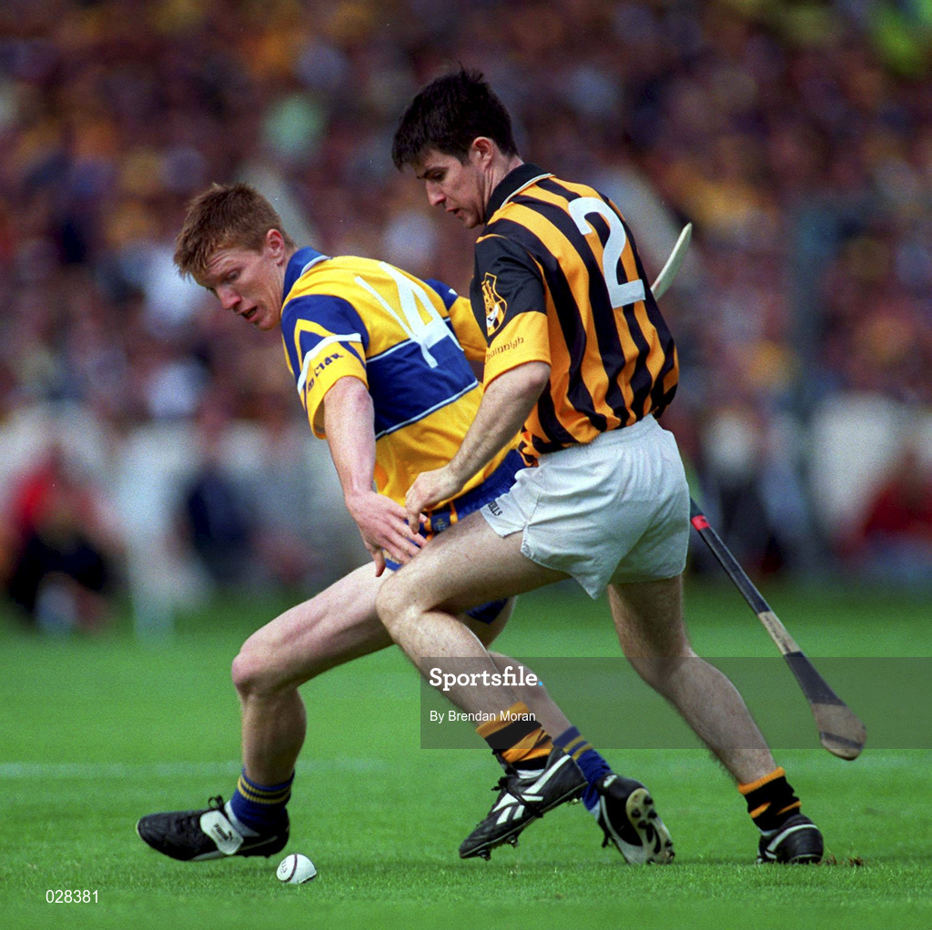 15 August 1999; Niall Gilligan of Clare in action against Philip Larkin of Kilkenny during the Guinness All-Ireland Senior Hurling Championship Semi-Final match between Kilkenny and Clare at Croke Park in Dublin. Photo by Brendan Moran/Sportsfile