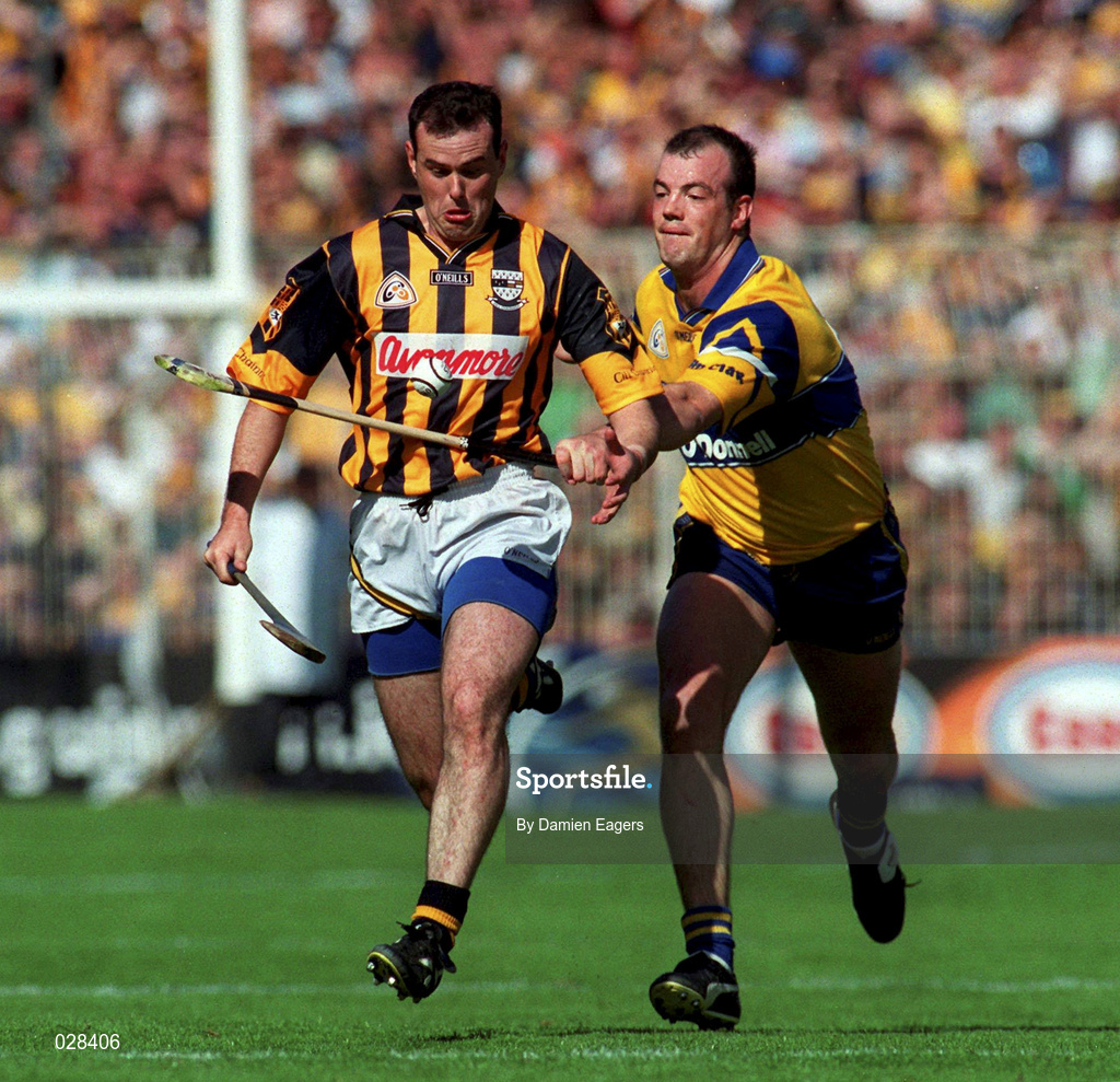 15 August 1999; Brian McEvoy of Kilkenny in action against Ollie Baker of Clare during the Guinness All-Ireland Senior Hurling Championship Semi-Final match between Kilkenny and Clare at Croke Park in Dublin. Photo by Damien Eagers/Sportsfile