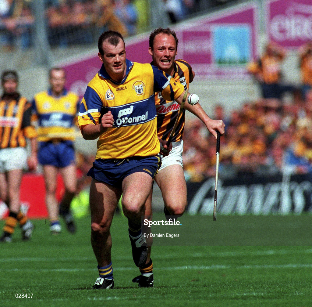 15 August 1999; Ollie Baker of Clare is tackled by Andy Comerford of Kilkenny during the Guinness All-Ireland Senior Hurling Championship Semi-Final match between Kilkenny and Clare at Croke Park in Dublin. Photo by Damien Eagers/Sportsfile
