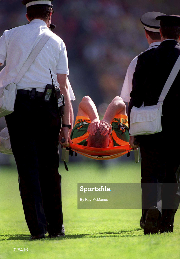 29 August 1999; Meath's Ollie Murphy is stretchered off the field after picking up an injury during the Bank of Ireland All-Ireland Senior Football Championship Semi-Final match between Meath and Armagh at Croke Park in Dublin. Photo by Ray McManus/Sportsfile