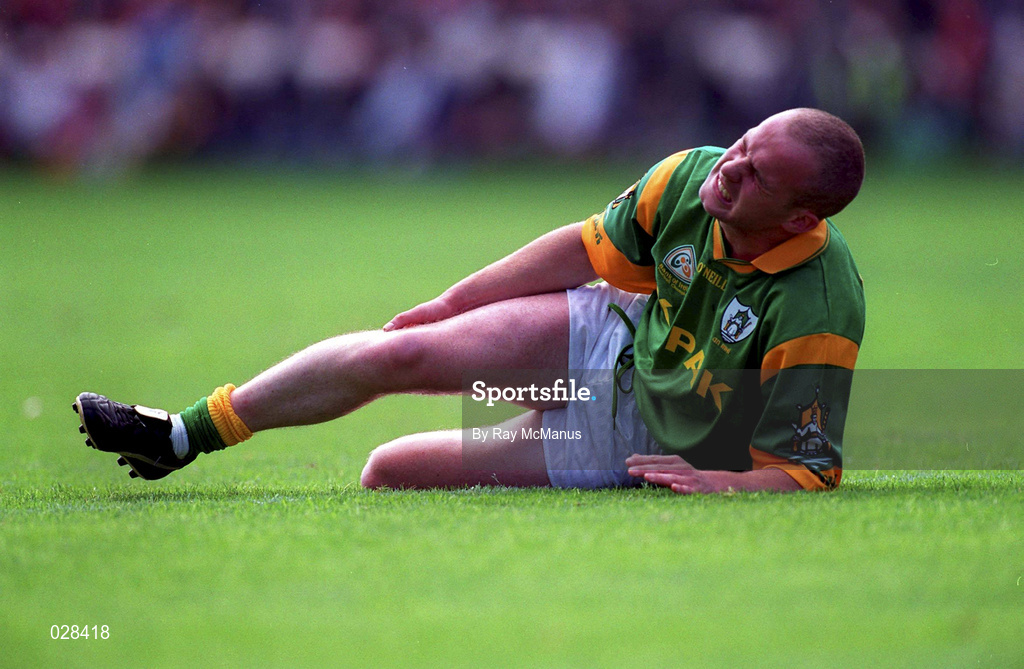 29 August 1999; Ollie Murphy of Meath goes down with an injury during the Bank of Ireland All-Ireland Senior Football Championship Semi-Final match between Meath and Armagh at Croke Park in Dublin. Photo by Ray McManus/Sportsfile