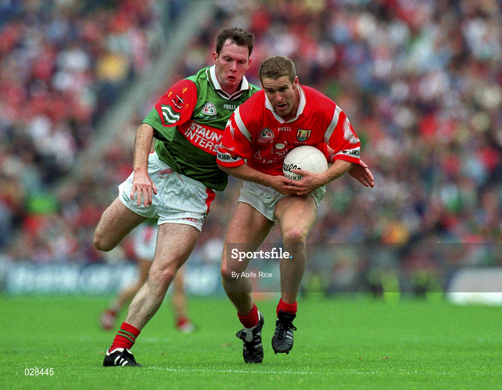 22 August 1999; Cork's Padraig O'Mahony is tackled by Fergal Costello of Mayo during the Bank of Ireland All-Ireland Senior Football Championship Semi-Final match between Cork and Mayo at Croke Park in Dublin. Photo by Aoife Rice/Sportsfile