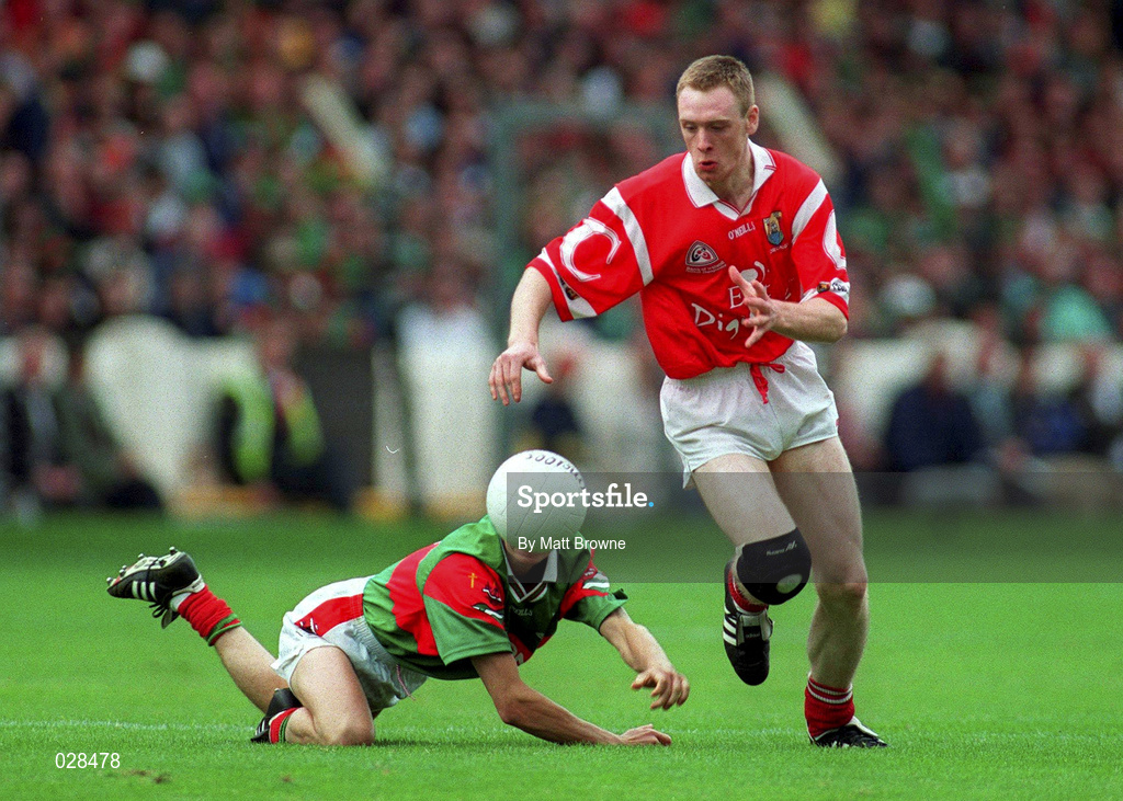 22 August 1999; Philip Clifford of Cork in action against Aidan Higgins of Mayo during the Bank of Ireland All-Ireland Senior Football Championship Semi-Final match between Cork and Mayo at Croke Park in Dublin. Photo by Matt Browne/Sportsfile