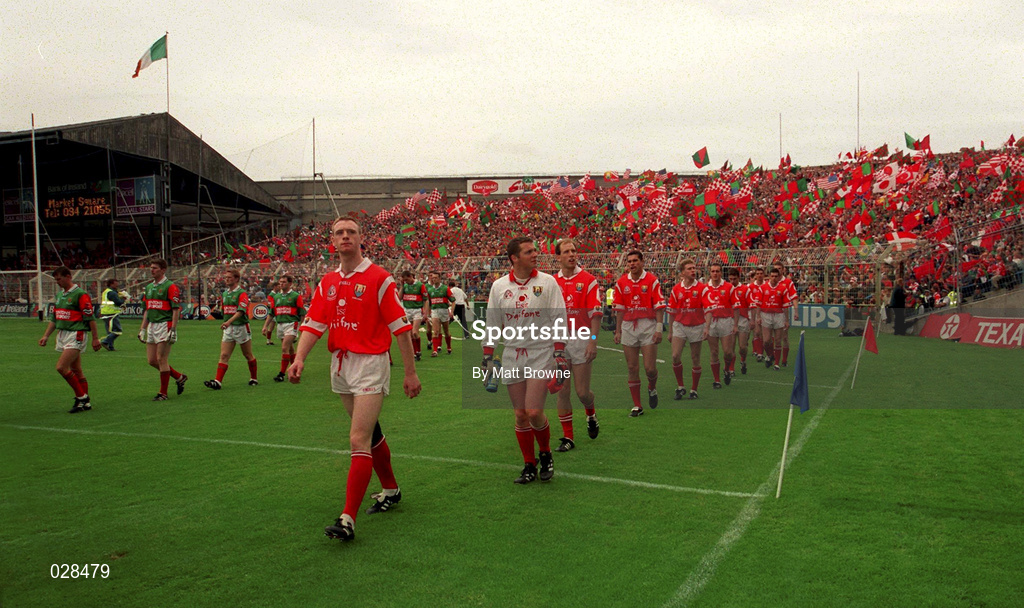22 August 1999; Cork captain Philip Clifford leads his side during the pre-match parade ahead of the Bank of Ireland All-Ireland Senior Football Championship Semi-Final match between Cork and Mayo at Croke Park in Dublin. Photo by Matt Browne/Sportsfile