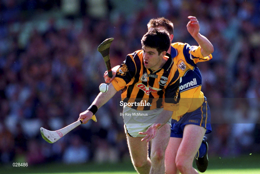 15 August 1999; Philip Larkin of Kilkenny in action against Niall Gilligan of Clare during the Guinness All-Ireland Senior Hurling Championship Semi-Final match between Kilkenny and Clare at Croke Park in Dublin. Photo by Ray McManus/Sportsfile