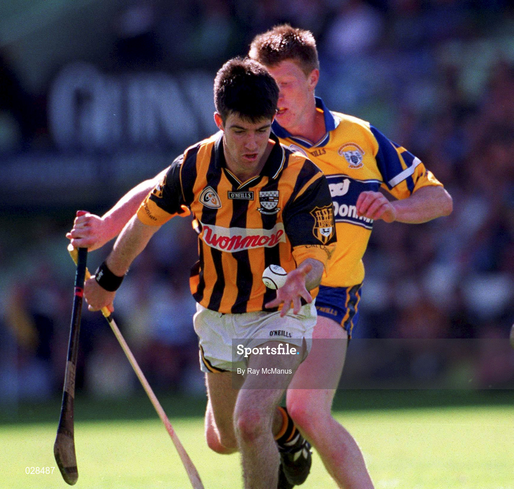 15 August 1999; Philip Larkin of Kilkenny in action against Niall Gilligan of Clare during the Guinness All-Ireland Senior Hurling Championship Semi-Final match between Kilkenny and Clare at Croke Park in Dublin. Photo by Ray McManus/Sportsfile