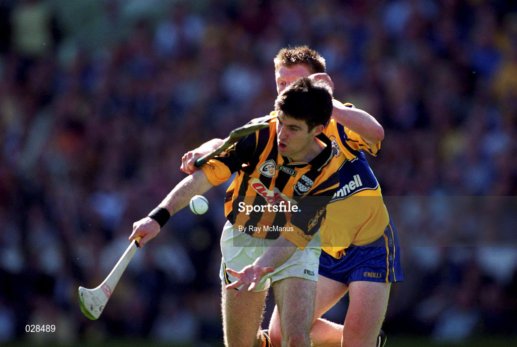 15 August 1999; Philip Larkin of Kilkenny in action against Niall Gilligan of Clare during the Guinness All-Ireland Senior Hurling Championship Semi-Final match between Kilkenny and Clare at Croke Park in Dublin. Photo by Ray McManus/Sportsfile