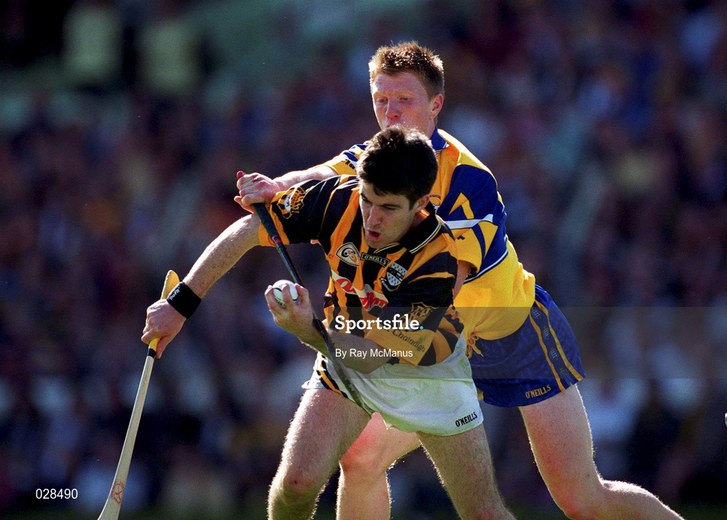 15 August 1999; Philip Larkin of Kilkenny in action against Niall Gilligan of Clare during the Guinness All-Ireland Senior Hurling Championship Semi-Final match between Kilkenny and Clare at Croke Park in Dublin. Photo by Ray McManus/Sportsfile