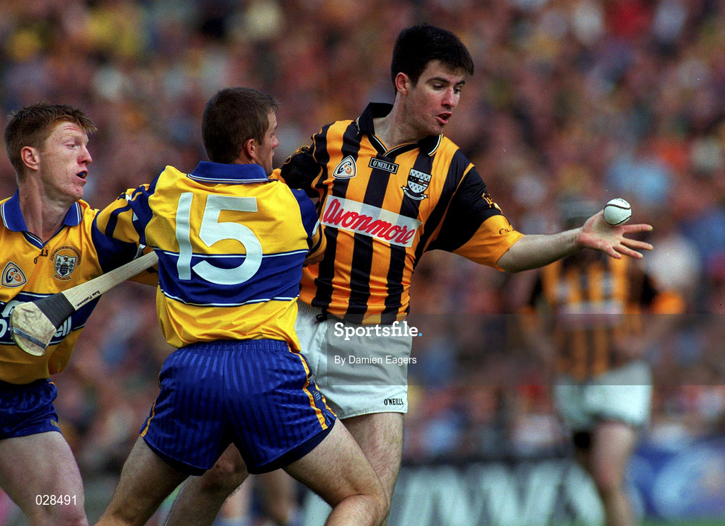 15 August 1999; Philip Larkin of Kilkenny in action against Alan Markham, 15, and Niall Gilligan of Clare during the Guinness All-Ireland Senior Hurling Championship Semi-Final match between Kilkenny and Clare at Croke Park in Dublin. Photo by Damien Eagers/Sportsfile