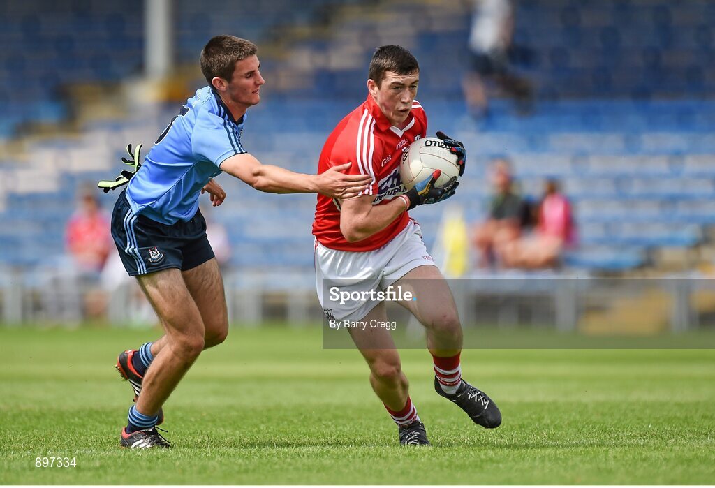 4 August 2014; Seán O'Donoghue, Cork, in action against Jack Carey, Dublin. Electric Ireland GAA Football All-Ireland Minor Championship Quarter-Final, Dublin v Cork, Semple Stadium, Thurles, Co. Tipperary. Picture credit: Barry Cregg / SPORTSFILE
