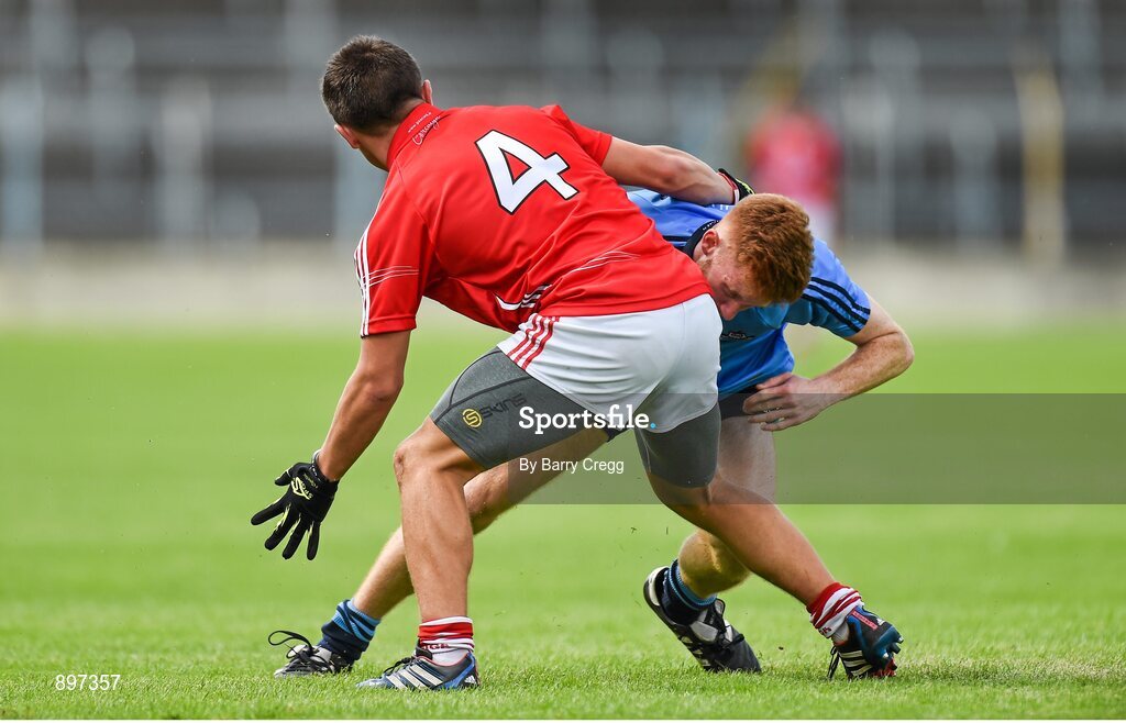 4 August 2014; Aaron Byrne, Dublin, in action against Seán Powter, Cork. Electric Ireland GAA Football All-Ireland Minor Championship Quarter-Final, Dublin v Cork, Semple Stadium, Thurles, Co. Tipperary. Picture credit: Barry Cregg / SPORTSFILE