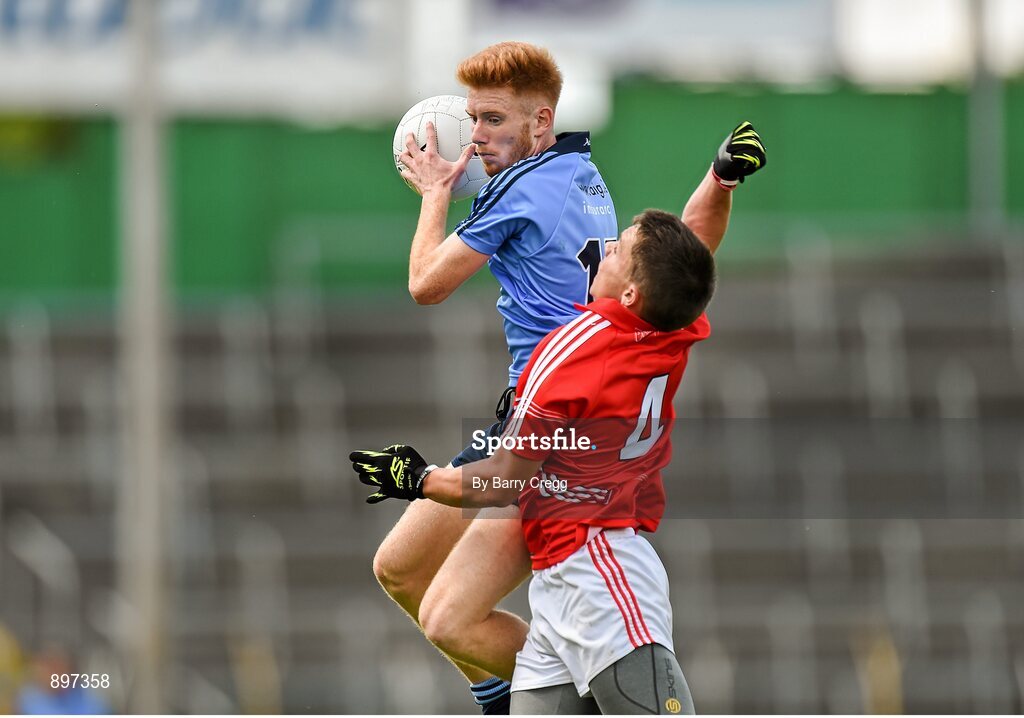 4 August 2014; Aaron Byrne, Dublin, in action against Seán Powter, Cork. Electric Ireland GAA Football All-Ireland Minor Championship Quarter-Final, Dublin v Cork, Semple Stadium, Thurles, Co. Tipperary. Picture credit: Barry Cregg / SPORTSFILE