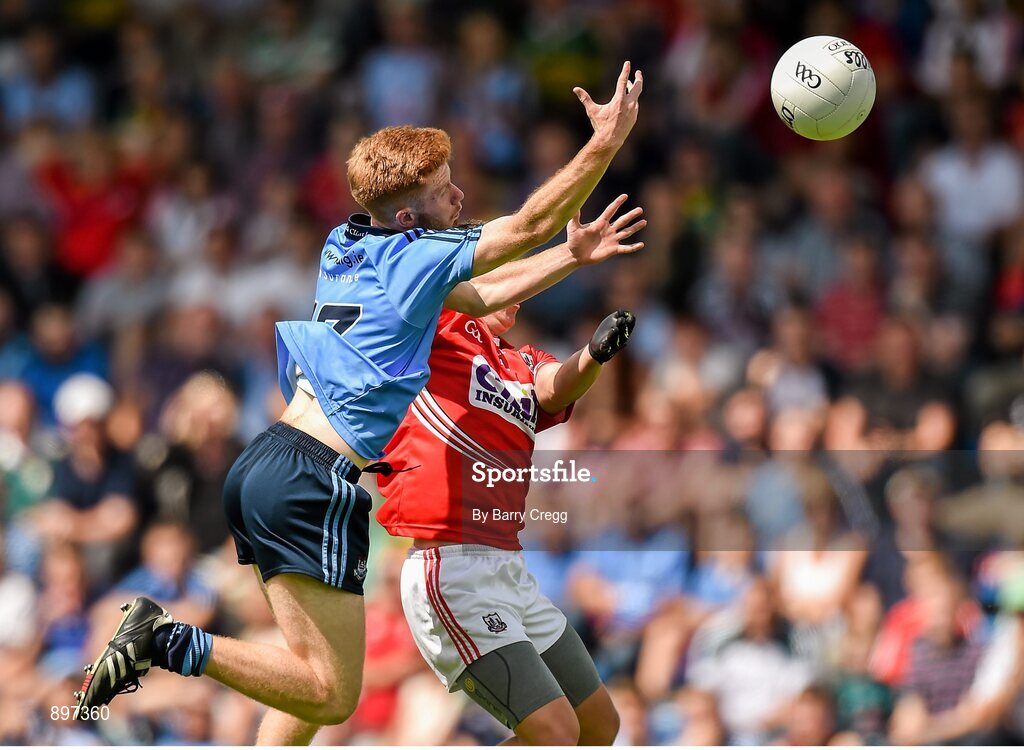 4 August 2014; Aaron Byrne, Dublin, in action against Seán Powter, Cork. Electric Ireland GAA Football All-Ireland Minor Championship Quarter-Final, Dublin v Cork, Semple Stadium, Thurles, Co. Tipperary. Picture credit: Barry Cregg / SPORTSFILE