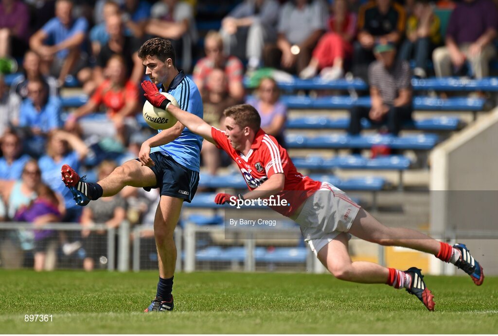 4 August 2014; Colm Basquel, Dublin, shot is blocked by Cian O'Donovan, Cork. Electric Ireland GAA Football All-Ireland Minor Championship Quarter-Final, Dublin v Cork, Semple Stadium, Thurles, Co. Tipperary. Picture credit: Barry Cregg / SPORTSFILE
