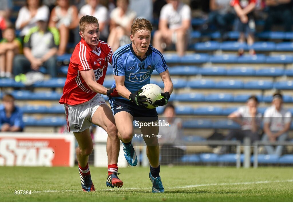 4 August 2014; Con O'Callaghan, Dublin, is fouled by Kevin Flahive, Cork which resulted in a penalty kick. Electric Ireland GAA Football All-Ireland Minor Championship Quarter-Final, Dublin v Cork, Semple Stadium, Thurles, Co. Tipperary. Picture credit: Barry Cregg / SPORTSFILE