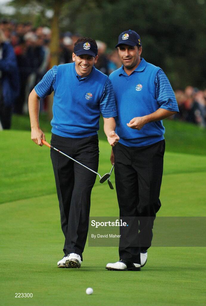 23 September 2006; Team Europe 2006 playing partners Sergio Garcia, left, and Jose Maria Olazabal in jovial mood during Saturday morning's four-ball matches. 36th Ryder Cup Matches, K Club, Straffan, Co. Kildare, Ireland. Picture credit: David Maher / SPORTSFILE