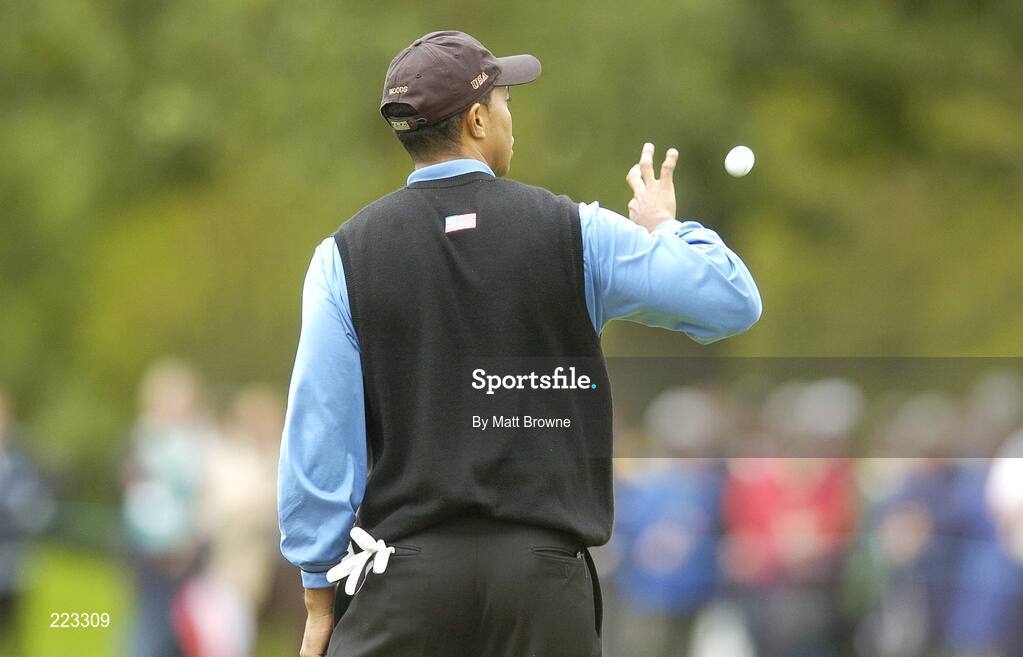 23 September 2006; Tiger Woods, Team USA 2006, catches his ball thrown by his caddy during Saturday morning's four-ball matches. 36th Ryder Cup Matches, K Club, Straffan, Co. Kildare, Ireland. Picture credit: Matt Browne / SPORTSFILE