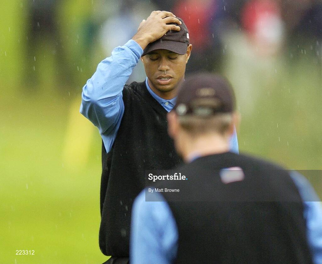 23 September 2006; Tiger Woods, Team USA 2006, reacts to a missed putt on the 11th green watched by partner Jim Furyk during Saturday morning's four-ball matches. 36th Ryder Cup Matches, K Club, Straffan, Co. Kildare, Ireland. Picture credit: Matt Browne / SPORTSFILE