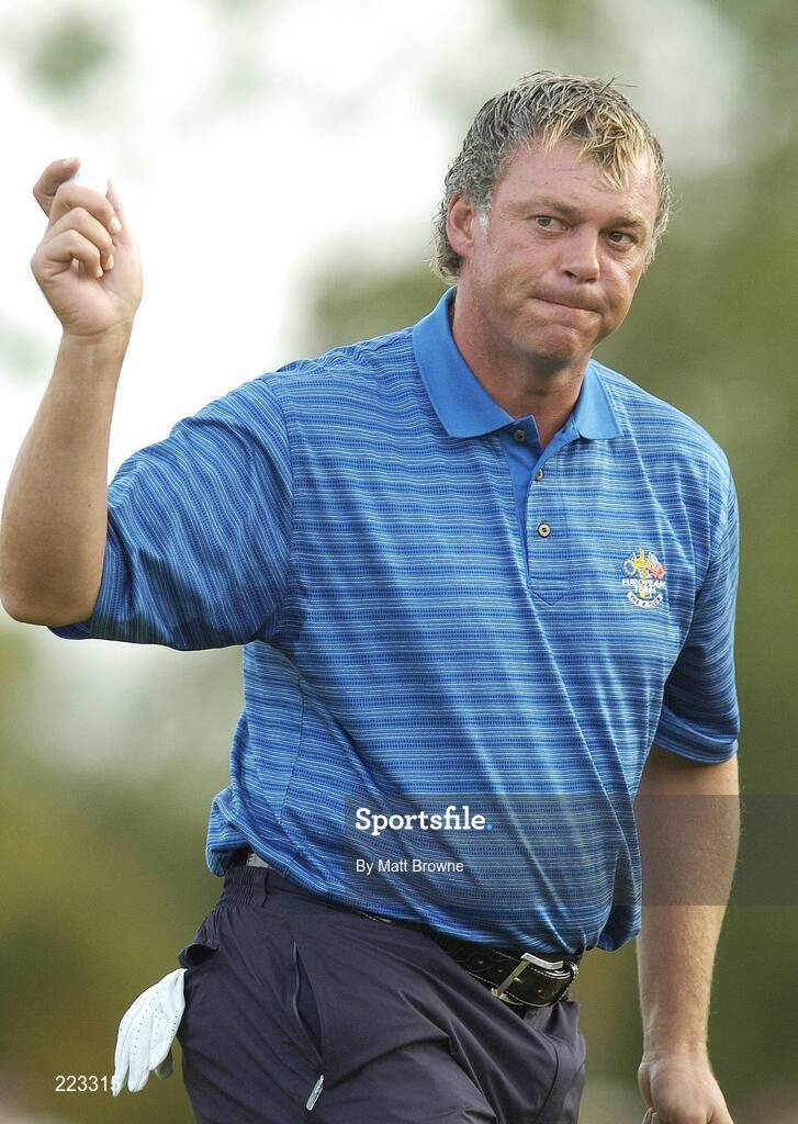 23 September 2006; Darren Clarke, Team Europe 2006, acknowleges the crowd after his putt on the ninth green during Saturday morning's four-ball matches. 36th Ryder Cup Matches, K Club, Straffan, Co. Kildare, Ireland. Picture credit: Matt Browne / SPORTSFILE
