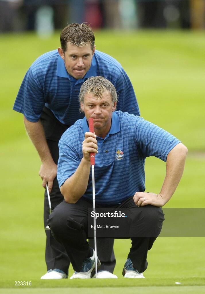 23 September 2006; Team Europe 2006 playing partners Darren Clarke, front, and Lee Westwood look at the lie on the sixth green during Saturday morning's four-ball matches. 36th Ryder Cup Matches, K Club, Straffan, Co. Kildare, Ireland. Picture credit: Matt Browne / SPORTSFILE