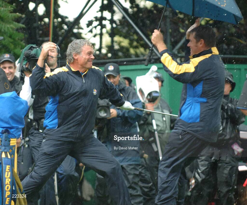 23 September 2006; Darren Clarke, left, Team Europe 2006, celebrates with playing partner Lee Westwood after his birdie pitch on the 16th hole for victory over Woods / Furyk during Saturday morning's four-ball matches. 36th Ryder Cup Matches, K Club, Straffan, Co. Kildare, Ireland. Picture credit: David Maher / SPORTSFILE