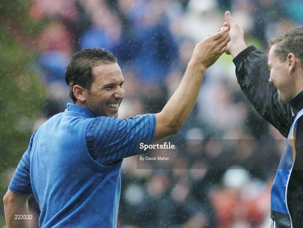 23 September 2006; Sergio Garcia, Team Europe 2006, celebrates with his caddy Glen Murray on the 16th green after victory over Mickelson / DiMarco during Saturday morning's four-ball matches. 36th Ryder Cup Matches, K Club, Straffan, Co. Kildare, Ireland. Picture credit: David Maher / SPORTSFILE