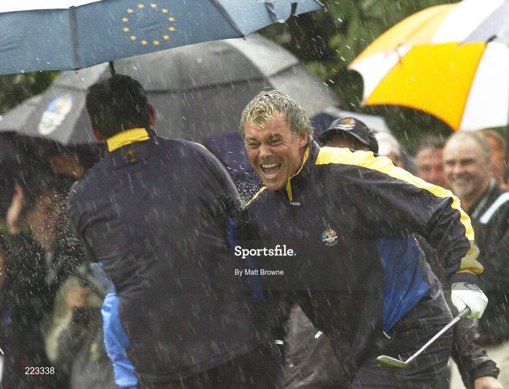 23 September 2006; Darren Clarke, Team Europe 2006, celebrates with playing partner Lee Westwood, left, after his birdie chip at the 16th hole for victory over Woods / Furyk during Saturday morning's four-ball matches. 36th Ryder Cup Matches, K Club, Straffan, Co. Kildare, Ireland. Picture credit: Matt Browne / SPORTSFILE