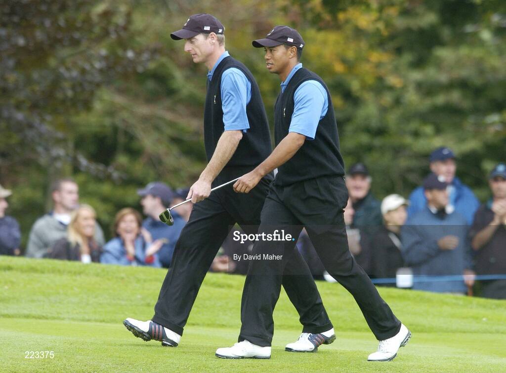 23 September 2006; Team USA 2006 playing partners Jim Furyk, left, and Tiger Woods during Saturday afternoon's foursomes matches. 36th Ryder Cup Matches, K Club, Straffan, Co. Kildare, Ireland. Picture credit: David Maher / SPORTSFILE