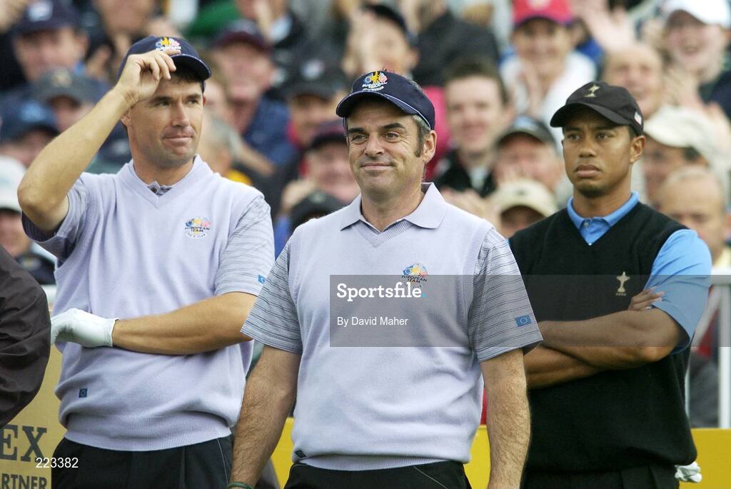 23 September 2006; Team Europe 2006 playing partners Padraig Harrington, left, and Paul McGinley, centre, with Tiger Woods, Team USA 2006, during Saturday afternoon's foursomes matches. 36th Ryder Cup Matches, K Club, Straffan, Co. Kildare, Ireland. Picture credit: David Maher / SPORTSFILE