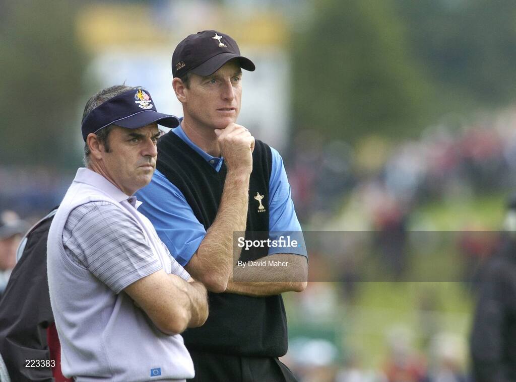 23 September 2006; Paul McGinley, left, Team Europe 2006, and Jim Furyk, Team USA 2006, wait to take their tee shots on the fourth hole during Saturday afternoon's foursomes matches. 36th Ryder Cup Matches, K Club, Straffan, Co. Kildare, Ireland. Picture credit: David Maher / SPORTSFILE