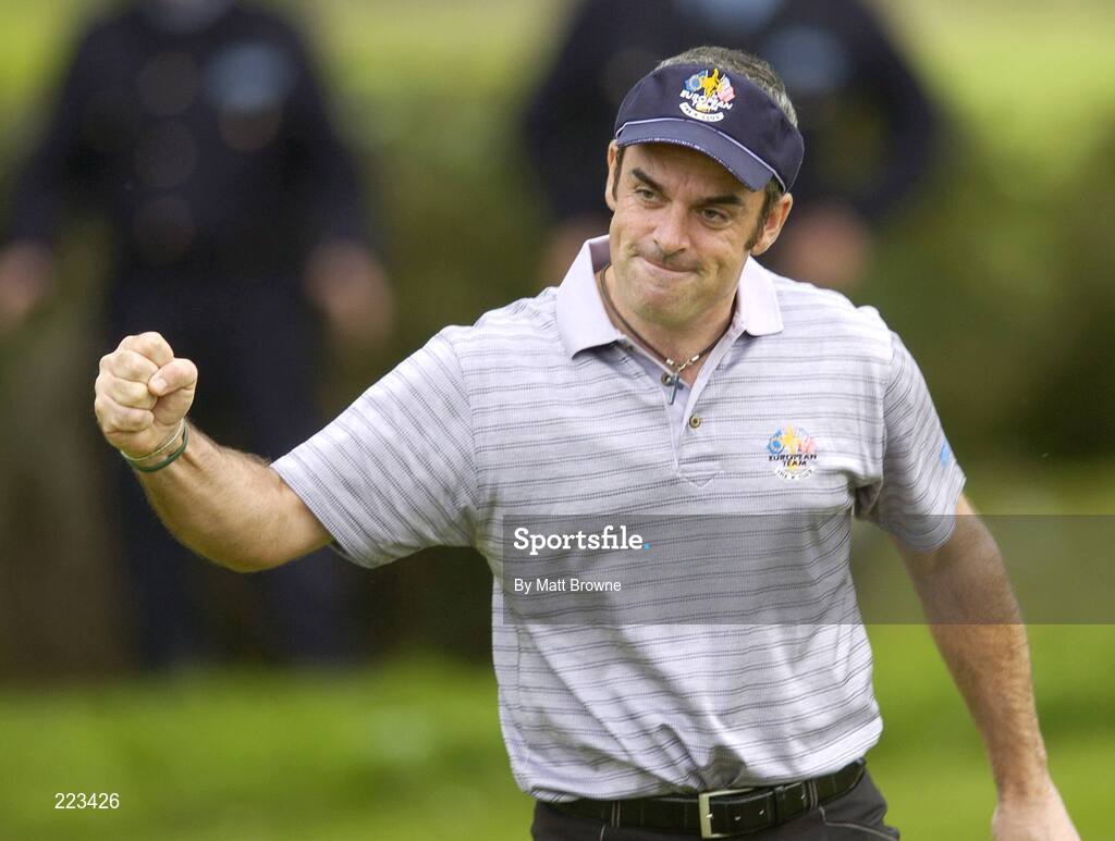 23 September 2006; Paul McGinley, Team Europe 2006, celebrates his putt on the eight green during Saturday afternoon's foursomes matches. 36th Ryder Cup Matches, K Club, Straffan, Co. Kildare, Ireland. Picture credit: Matt Browne / SPORTSFILE