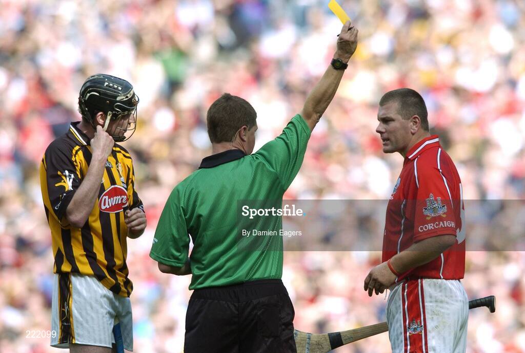 3 September 2006; Referee Barry Kelly shows the yellow card to Kilkenny's Martin Comerford and Cork's Diarmuid O'Sullivan. Guinness All-Ireland Senior Hurling Championship Final, Cork v Kilkenny, Croke Park, Dublin. Picture credit: Damien Eagers / SPORTSFILE