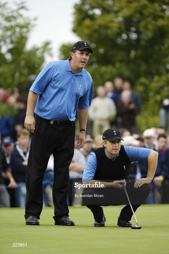 23 September 2006; Phil Mickelson, left, and David Toms, Team USA 2006, line up a putt on the 14th green during Saturday afternoon's foursomes matches. 36th Ryder Cup Matches, K Club, Straffan, Co. Kildare, Ireland. Picture credit: Brendan Moran / SPORTSFILE