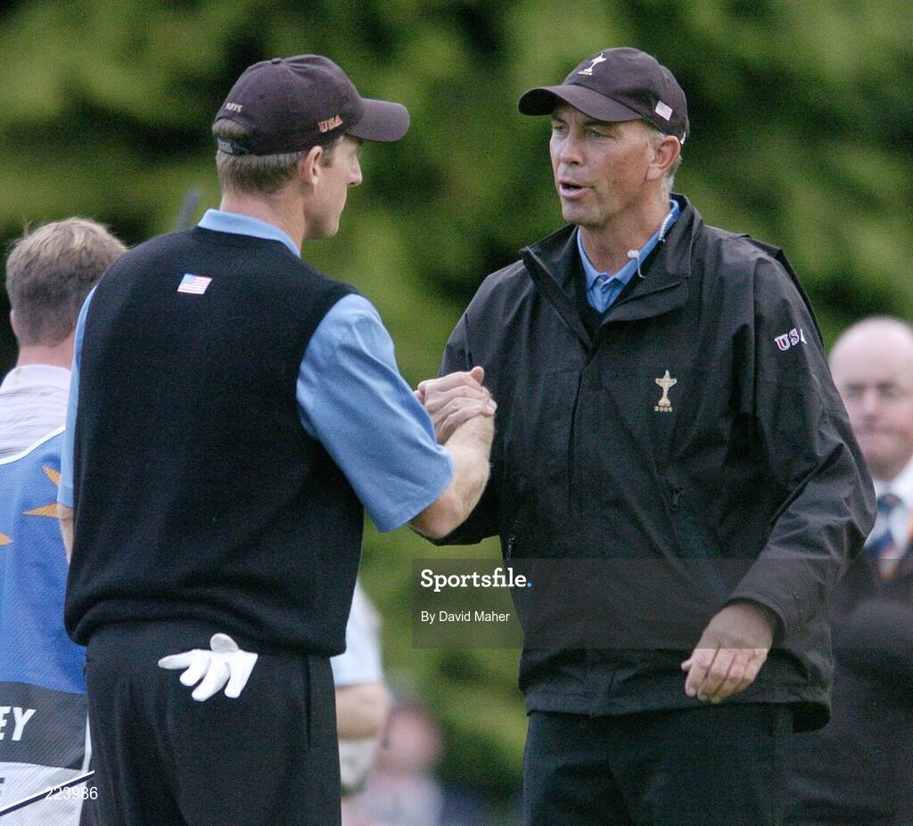 23 September 2006; Team USA 2006 captain Tom Lehman congratulates Jim Furyk after he and Tiger Woods defeated Paul McGinley and Padraig Harrington during Saturday afternoon's foursomes matches. 36th Ryder Cup Matches, K Club, Straffan, Co. Kildare, Ireland. Picture credit: David Maher / SPORTSFILE