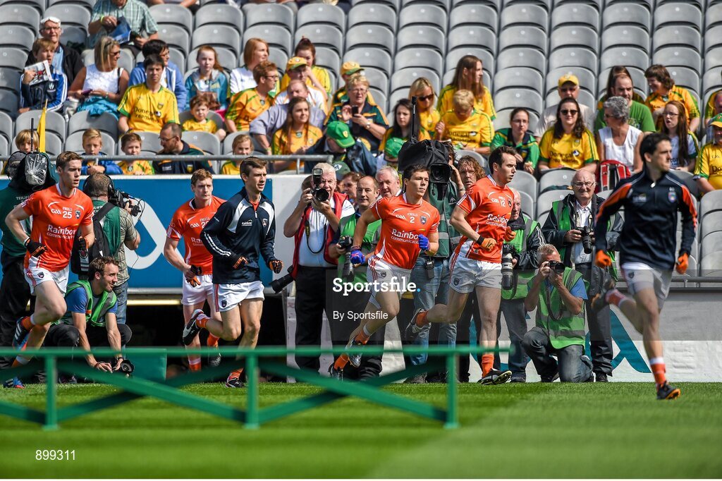 9 August 2014; The Armagh team run out on to the pitch and subsequently refused to pose for a team photograph. GAA Football All-Ireland Senior Championship, Quarter-Final, Donegal v Armagh, Croke Park, Dublin. Photo by Sportsfile