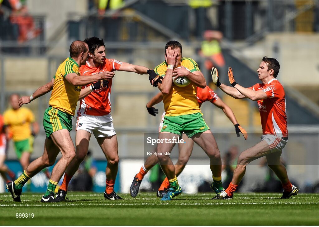 9 August 2014; Michael Murphy, Donegal, in action against Aaron Findon, left, and Tony Kernan, Armagh. GAA Football All-Ireland Senior Championship, Quarter-Final, Donegal v Armagh, Croke Park, Dublin. Photo by Sportsfile