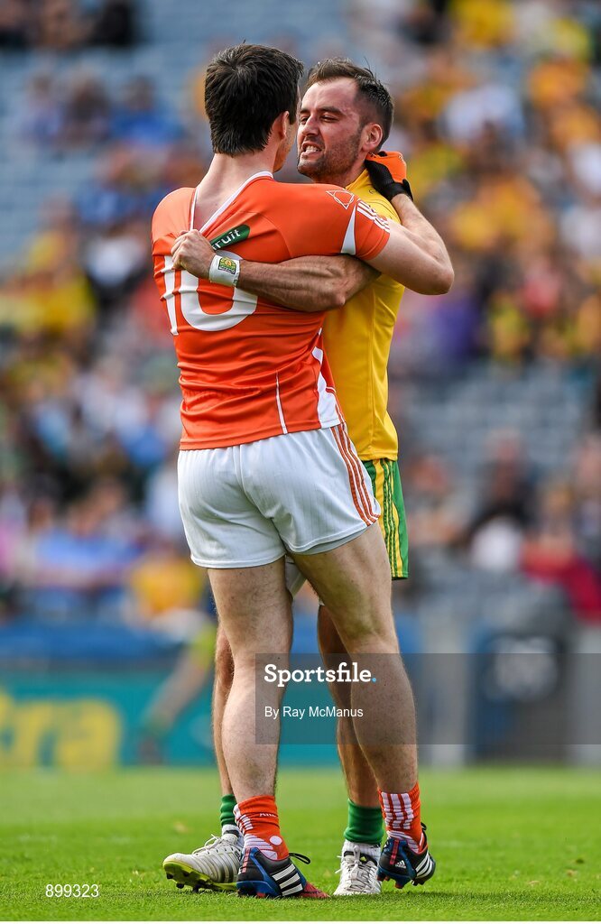 9 August 2014; Karl Lacey, Donegal, and Aidan Forker, Armagh, get to grips with each other early in the game. GAA Football All-Ireland Senior Championship, Quarter-Final, Donegal v Armagh, Croke Park, Dublin. Picture credit: Ray McManus / SPORTSFILE
