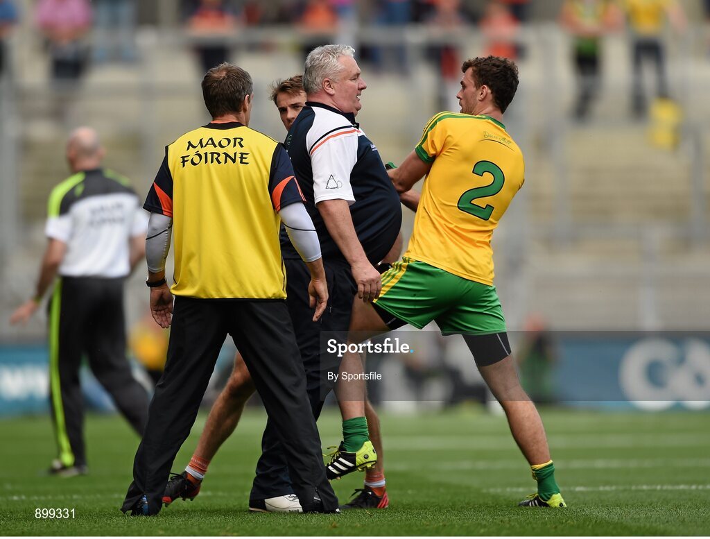 9 August 2014; Armagh manager Paul Grimley gets involved in an incident with Donegal's Eamonn McGee during the first half. GAA Football All-Ireland Senior Championship, Quarter-Final, Donegal v Armagh, Croke Park, Dublin. Photo by Sportsfile