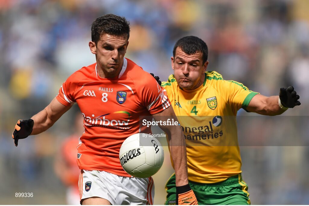 9 August 2014; Stephen Harold, Armagh, in action against Frank McGlynn, Donegal. GAA Football All-Ireland Senior Championship, Quarter-Final, Donegal v Armagh, Croke Park, Dublin. Photo by Sportsfile