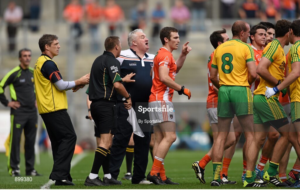 9 August 2014; Armagh manager Paul Grimley is held back by Kieran McGeeney as he gets involved in an incident during the first half. GAA Football All-Ireland Senior Championship, Quarter-Final, Donegal v Armagh, Croke Park, Dublin. Photo by Sportsfile