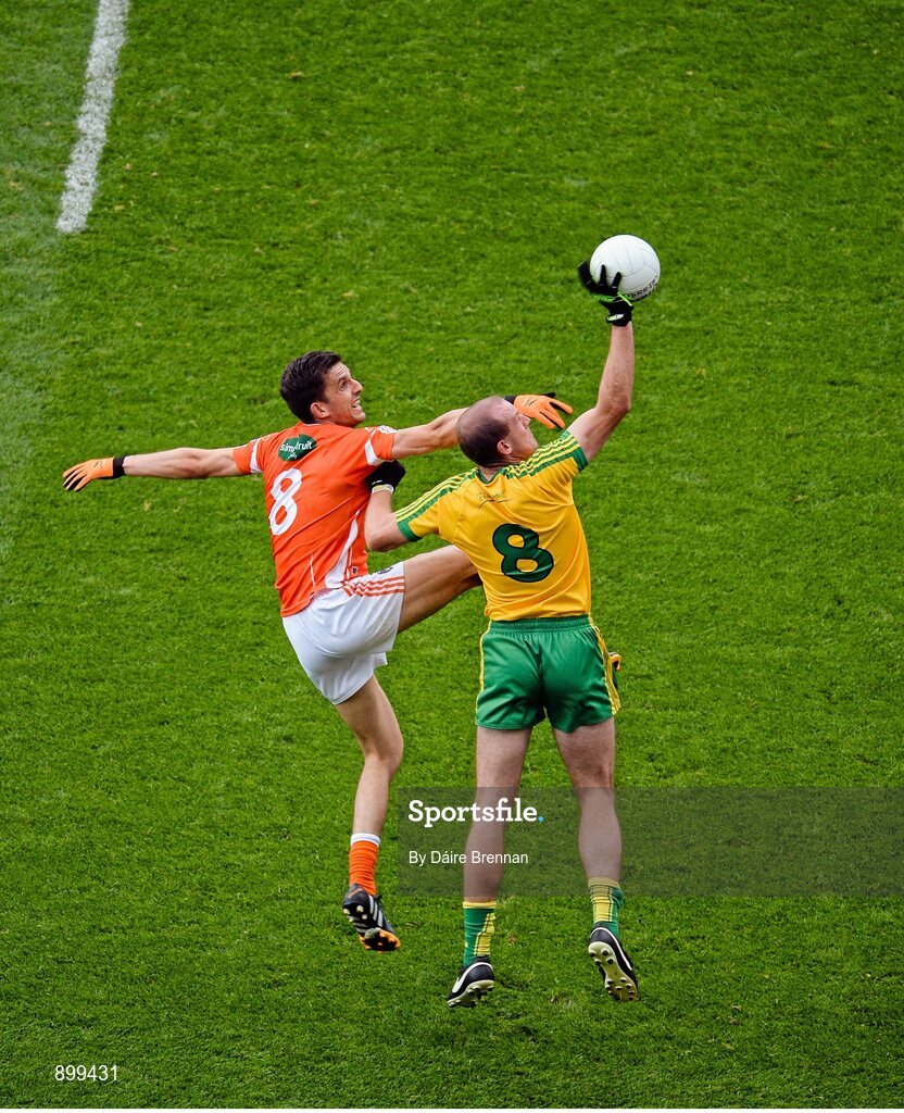 9 August 2014; Neil Gallagher, Donegal, in action against Stephen Harold, Armagh. GAA Football All-Ireland Senior Championship, Quarter-Final, Donegal v Armagh, Croke Park, Dublin. Picture credit: Dáire Brennan / SPORTSFILE