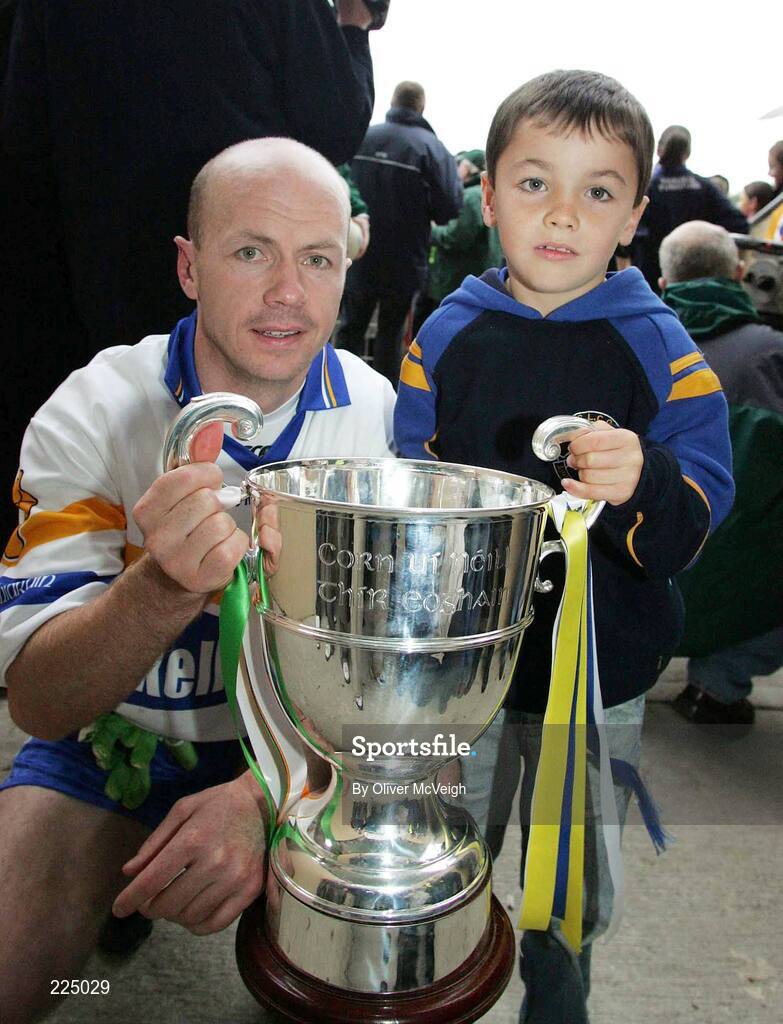 8 October 2006; Errigal Ciaran captain Peter Canavan and his son Darragh holds the O'Neill Cup. WJ Dolan Tyrone Senior Football Championship Final Replay, Errigal Ciaran v Carrickmore, Healy Park, Omagh, Co Tyrone. Picture credit: Oliver McVeigh / SPORTSFILE